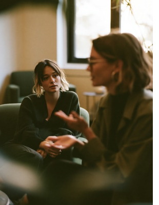 Client listening during a counselling session, representing trust, communication and finding the right counsellor Client listening during a counselling session, representing trust, communication and finding the right counsellor