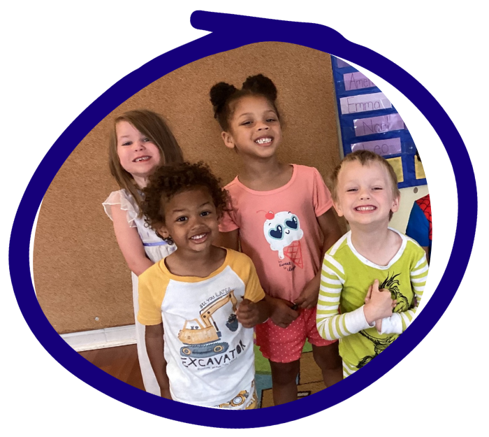 children smiling at daycare in Maryland