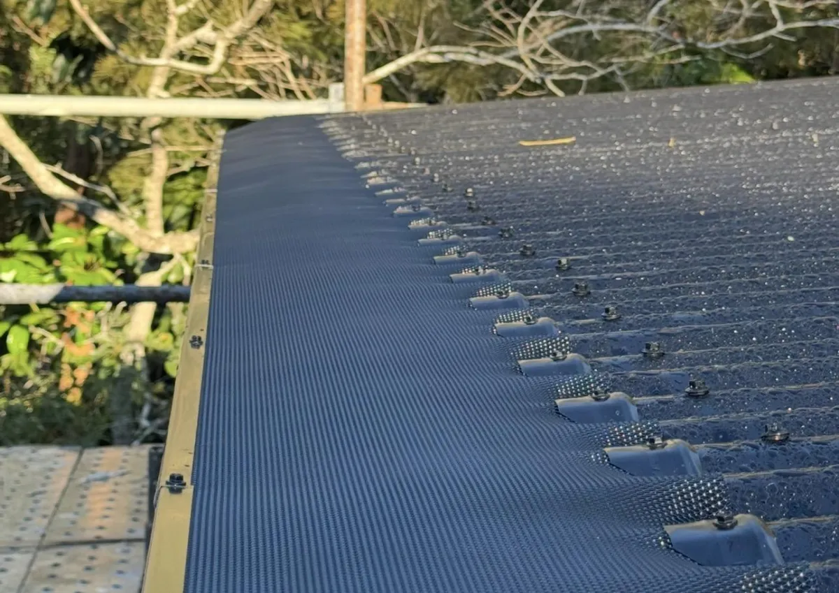 Dark corrugated gutter guard installation Victoria