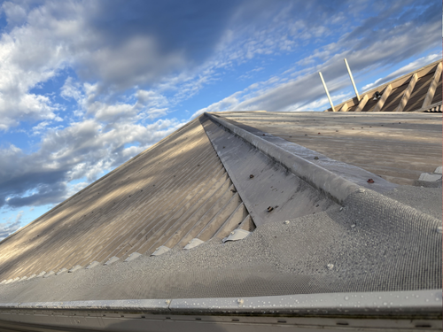 Corrugated gutter guard — coastal ocean view
