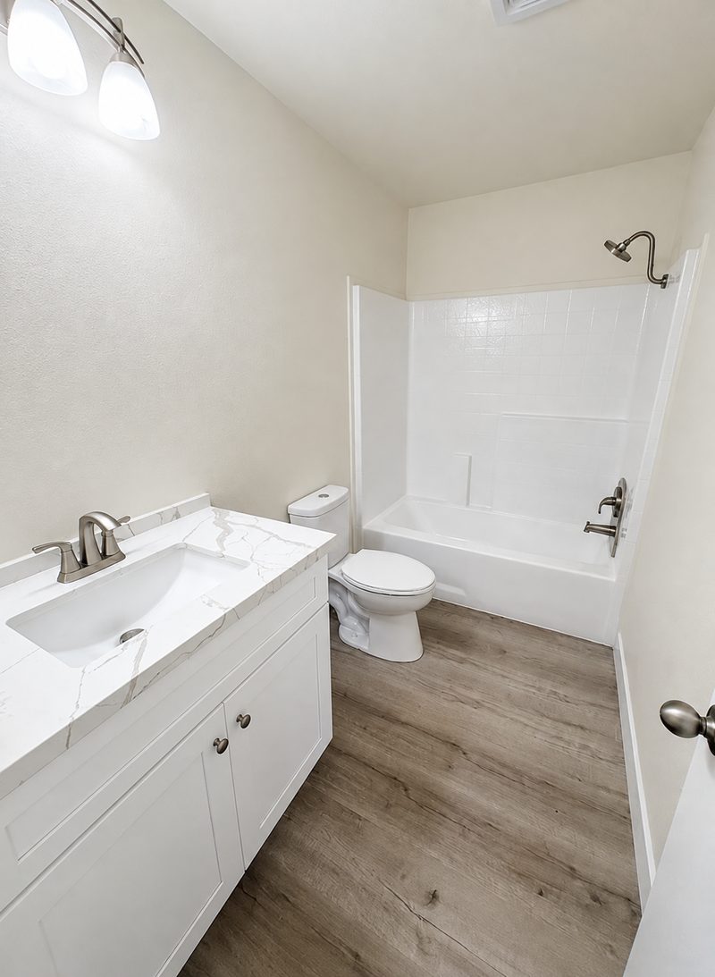 Hallway bathroom after renovation by KDI, Via Santiago
