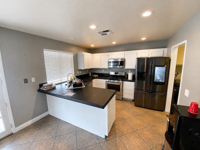 Kitchen &mdash; entry view before renovation, Fairfield St.