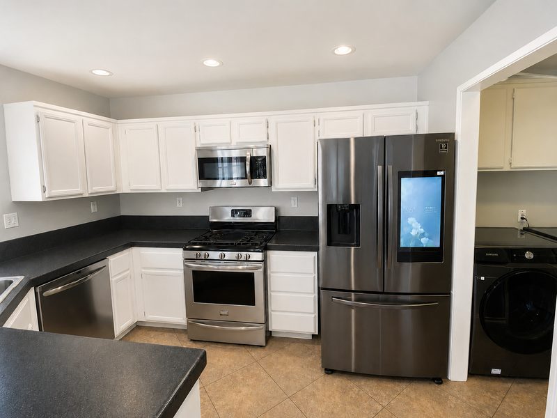 Kitchen &mdash; range wall before renovation, Fairfield St.