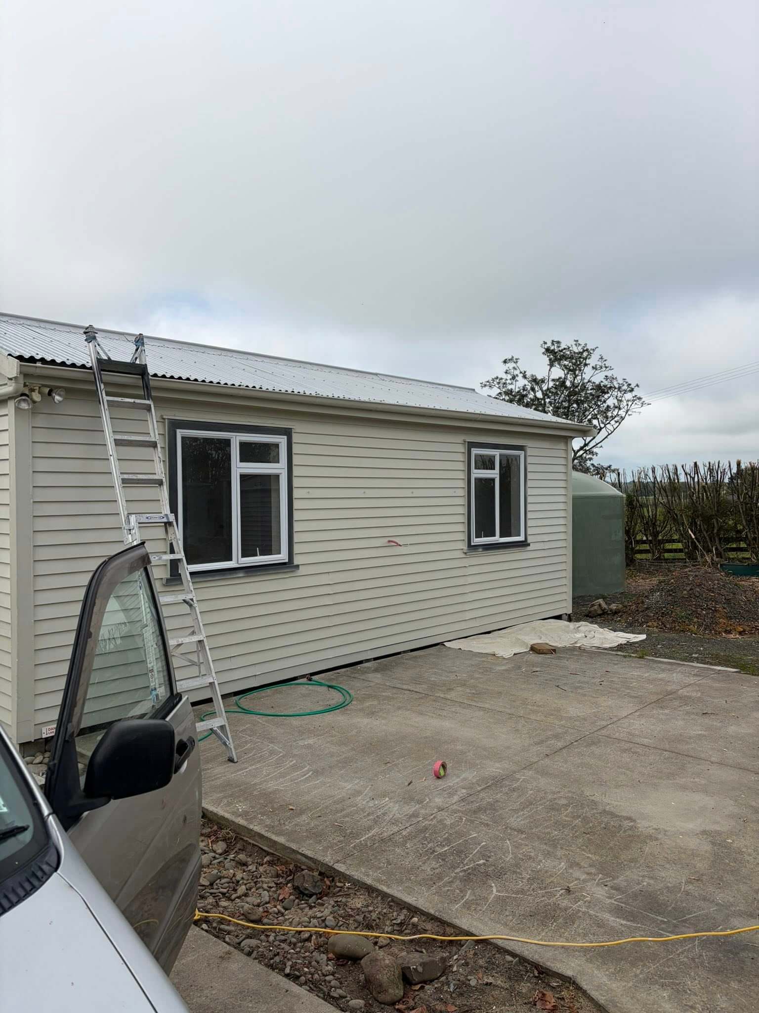 Exterior house repaint completed by Hamilton painters