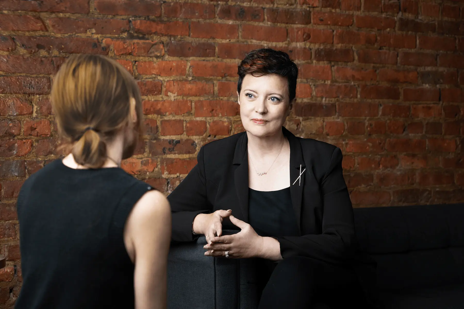 Vanessa Cardenas listening during a private relationship coaching conversation