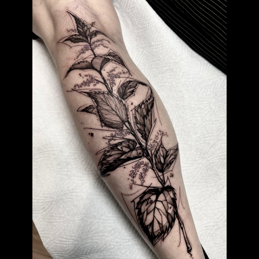 Tattoo by Santo Cuervo Tattoo Collective