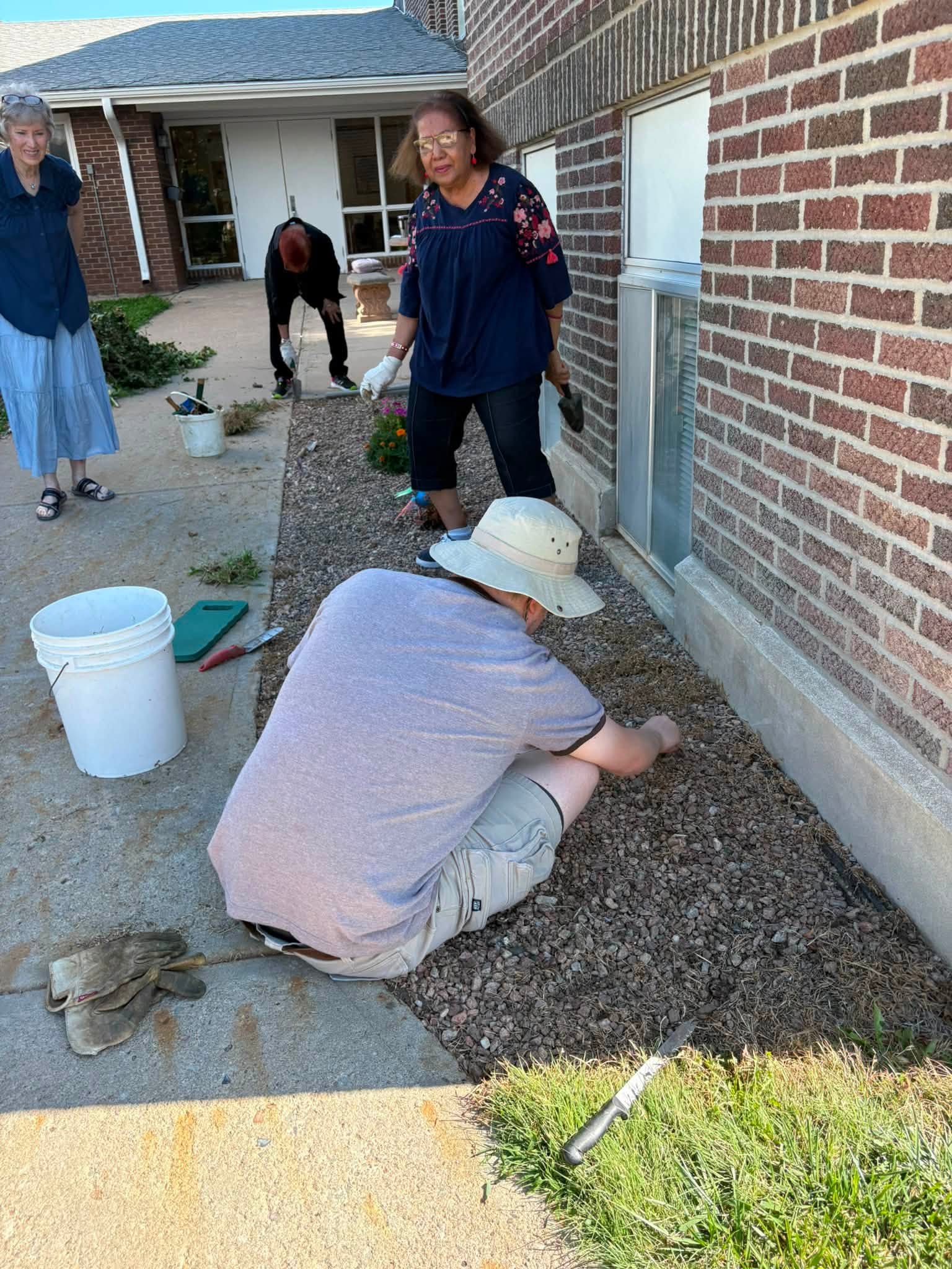 Members serving — landscaping and yard cleanup