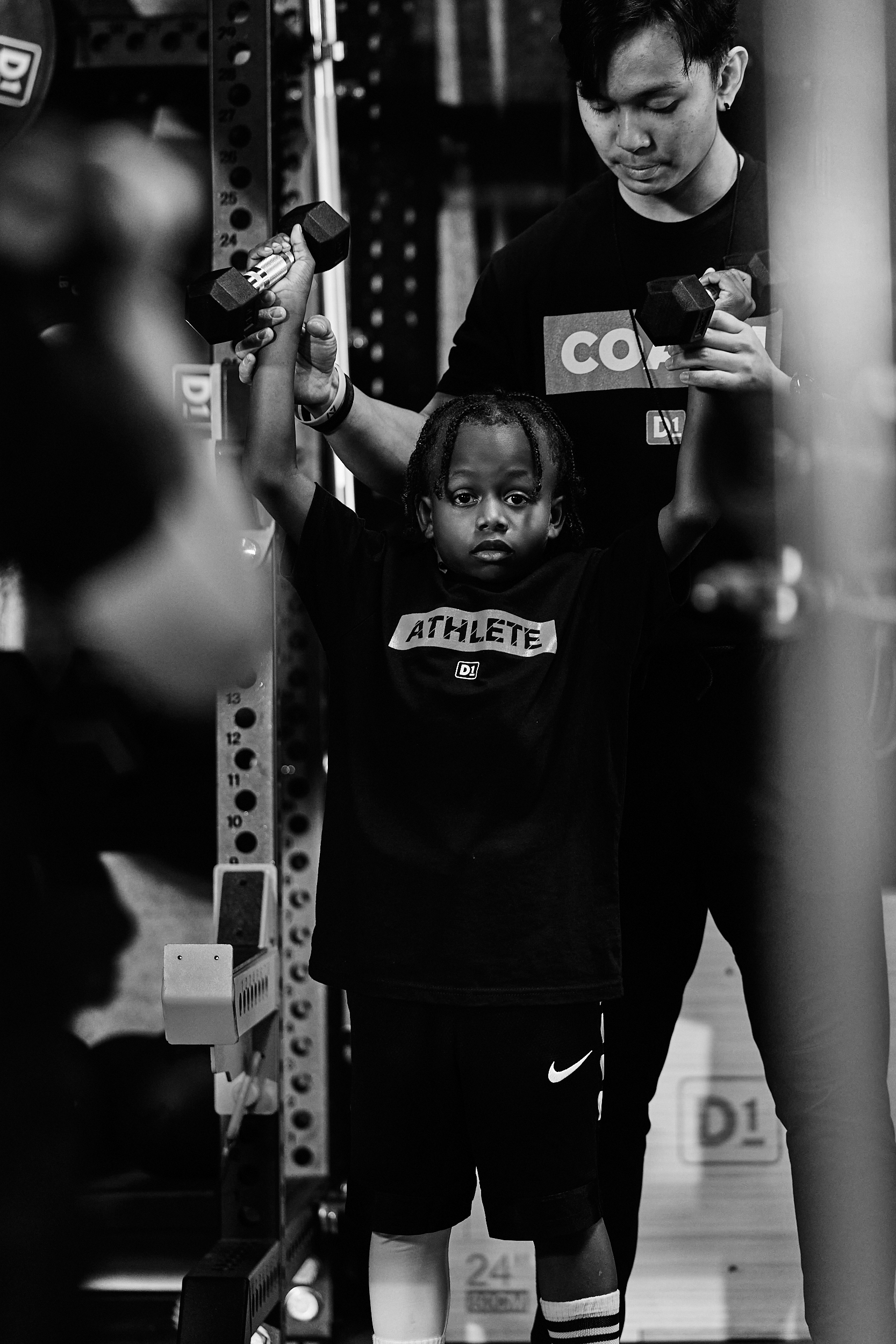 young athlete working with coach