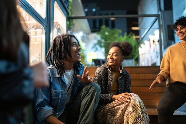 Young people laughing together