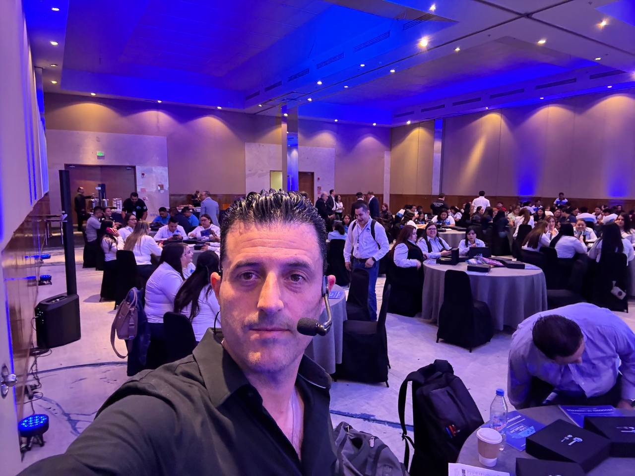 Yigal Adato speaking to audience