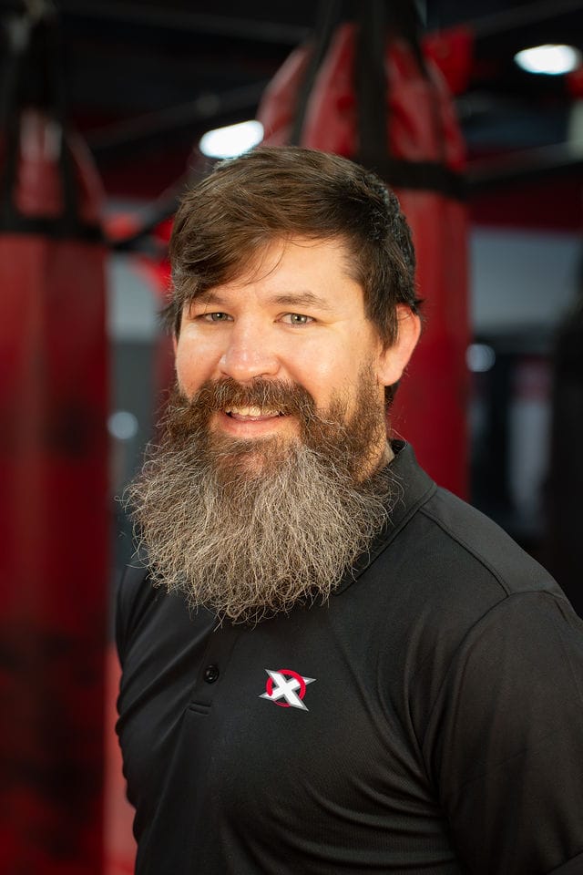 Portrait of Coach Cody Freeland