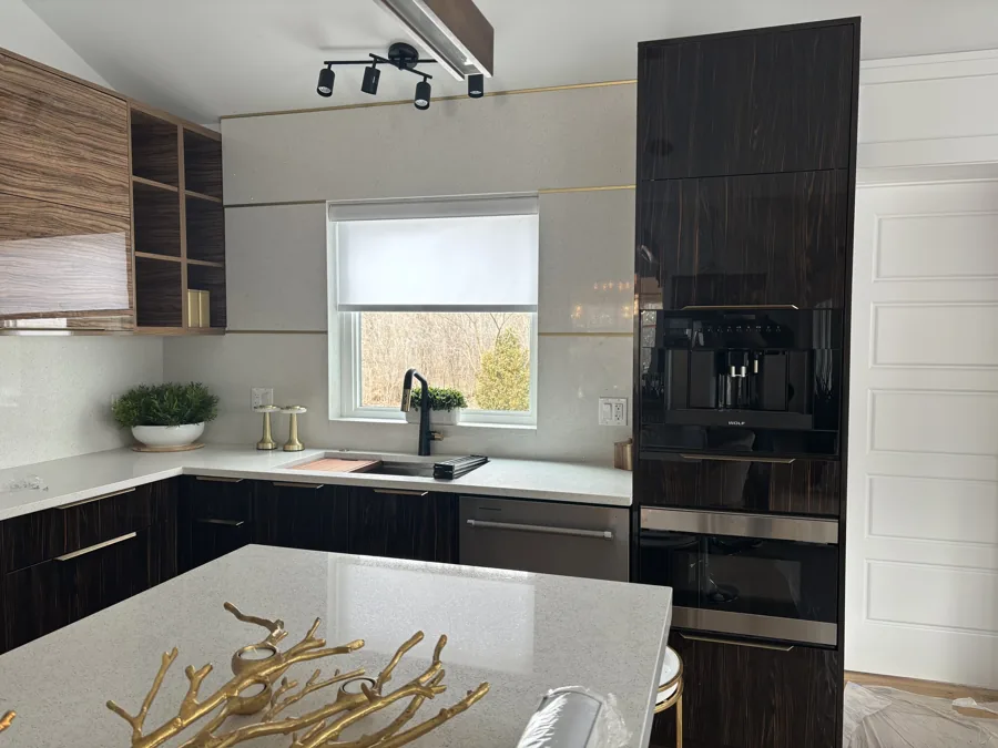 Custom manual roller shades in a kitchen