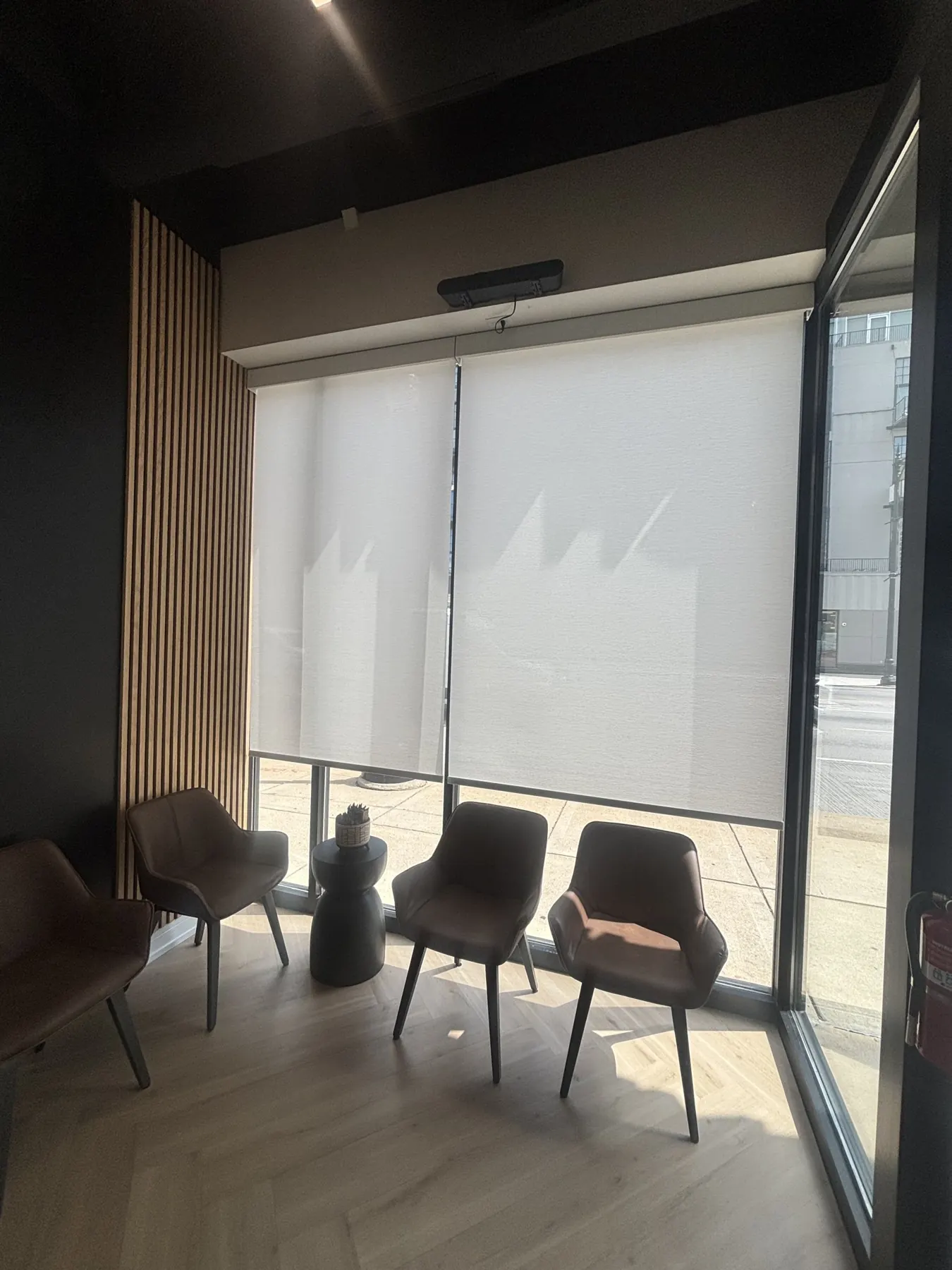 Roller shades on a cafe storefront window