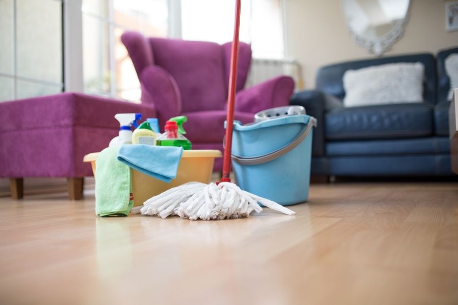 Professional house cleaner working in a bright Rancho Cucamonga kitchen