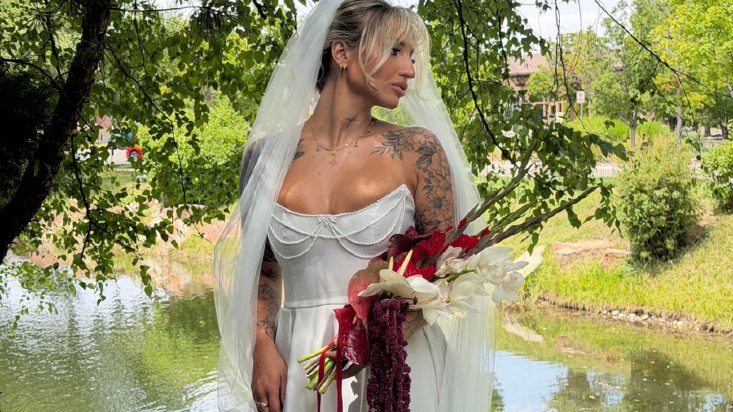 A Waters Edge bride beside the water