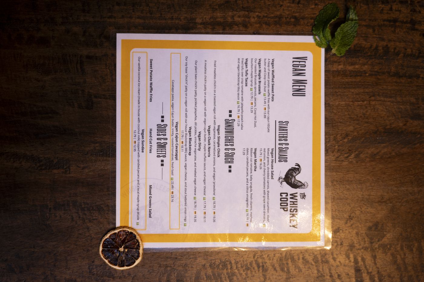 Styled menu and cocktail flatlay shot on location