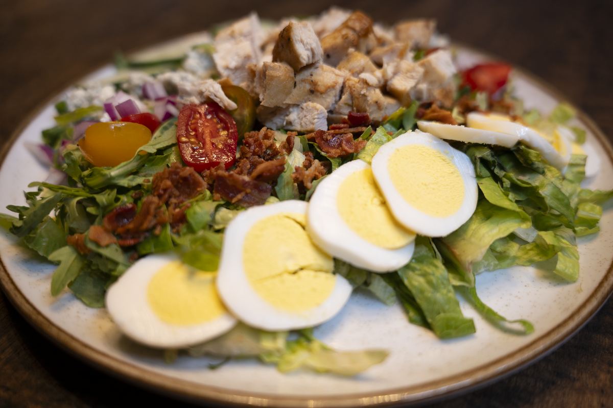 Cobb salad on a ceramic plate
