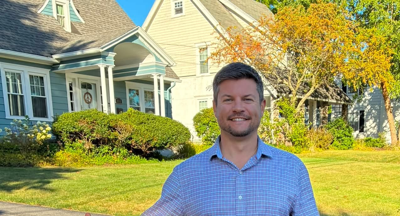 Brandon Camperlino on a tree-lined street in his district