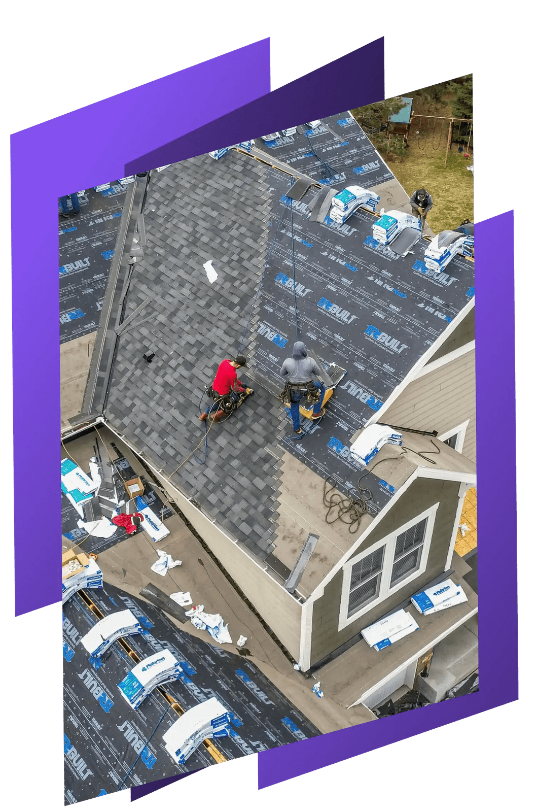 Roofers installing new shingles on a home
