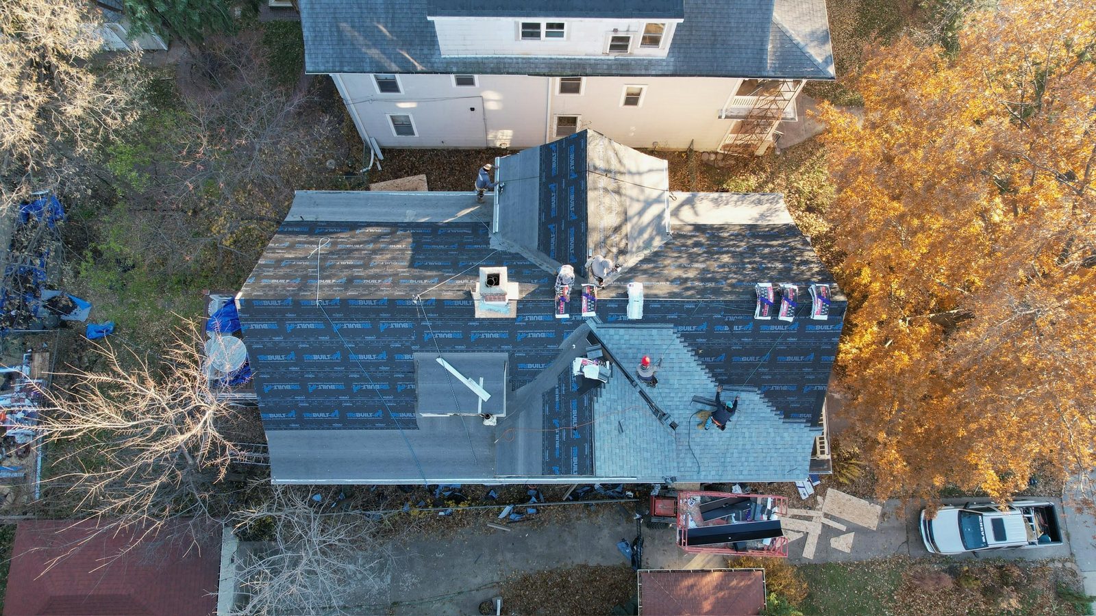 Roof replacement in progress in the fall