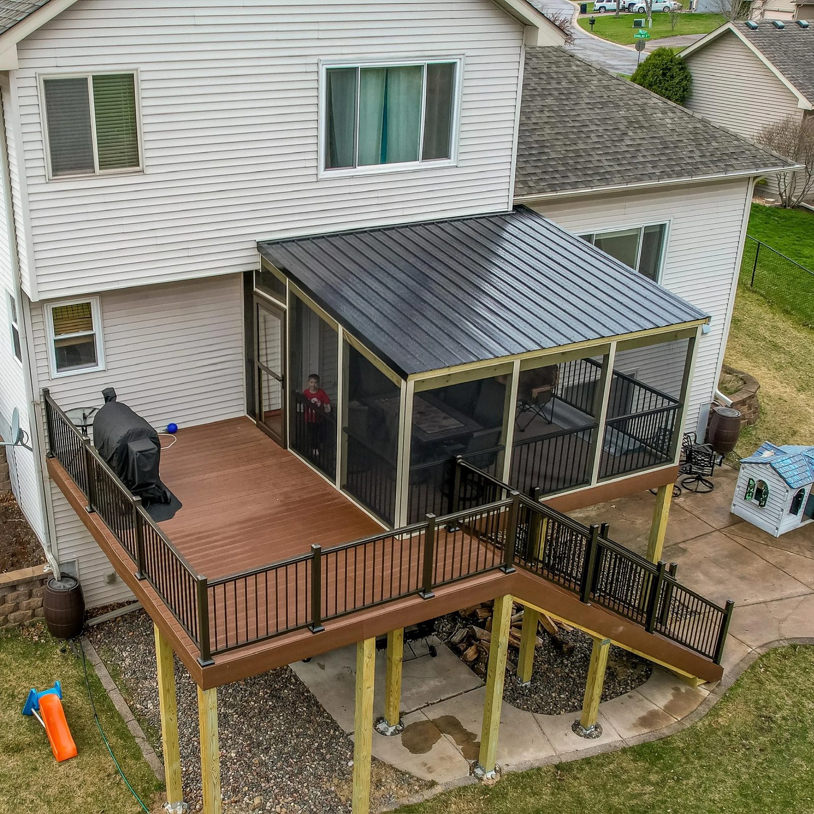 Composite deck with screened porch seen from the side