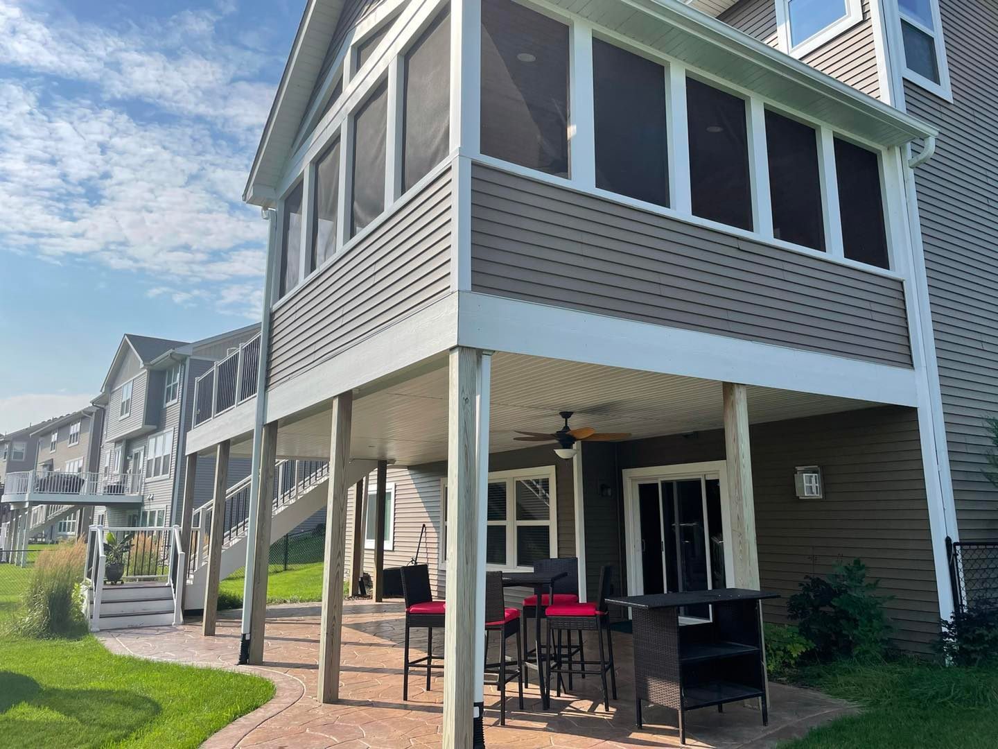 Elevated three-season porch over a covered patio