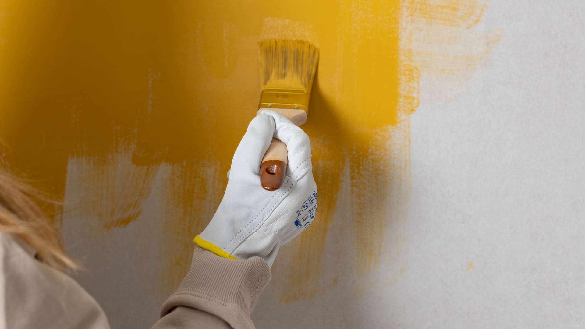 warehouse wall repair and painting preparation