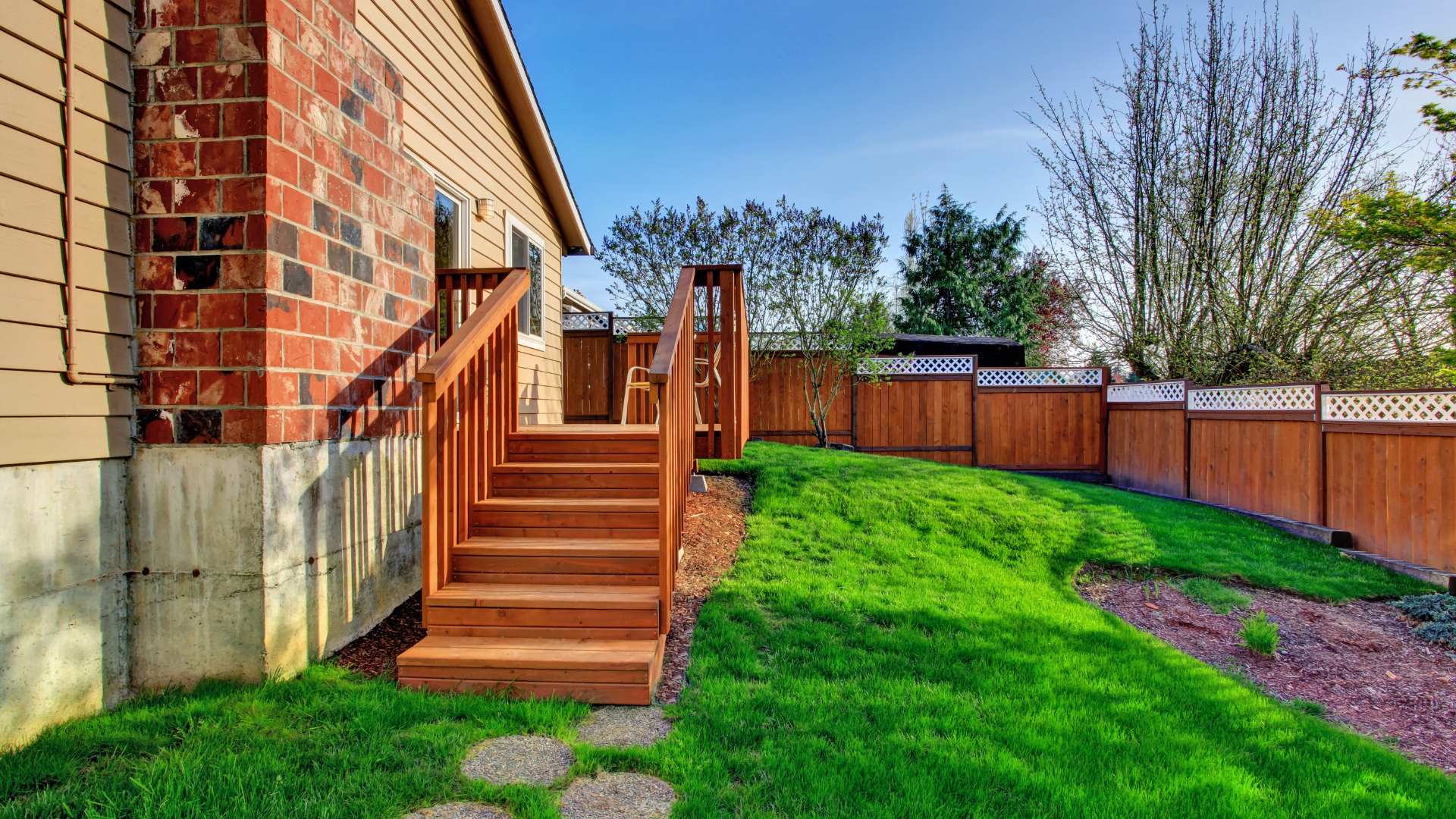 backyard fence painting project in Seminole residential property