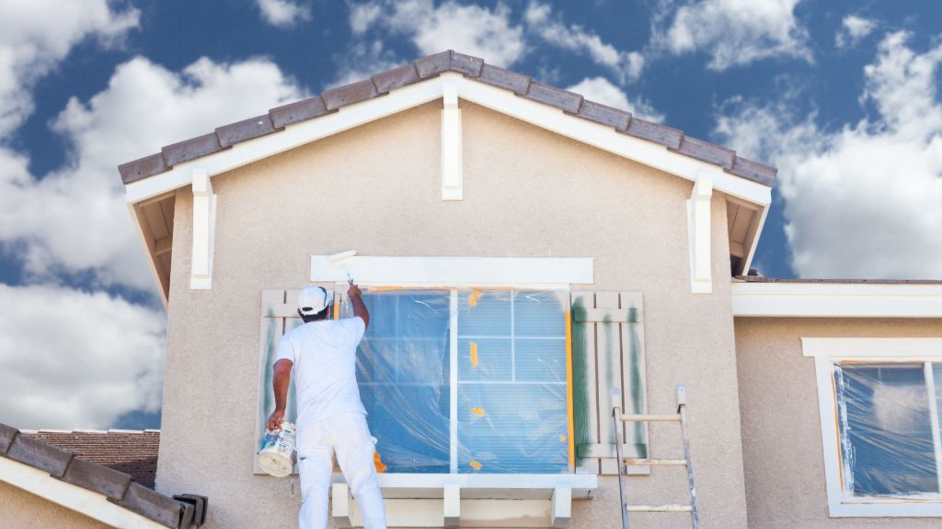 before-and-after of stucco exterior house repainting