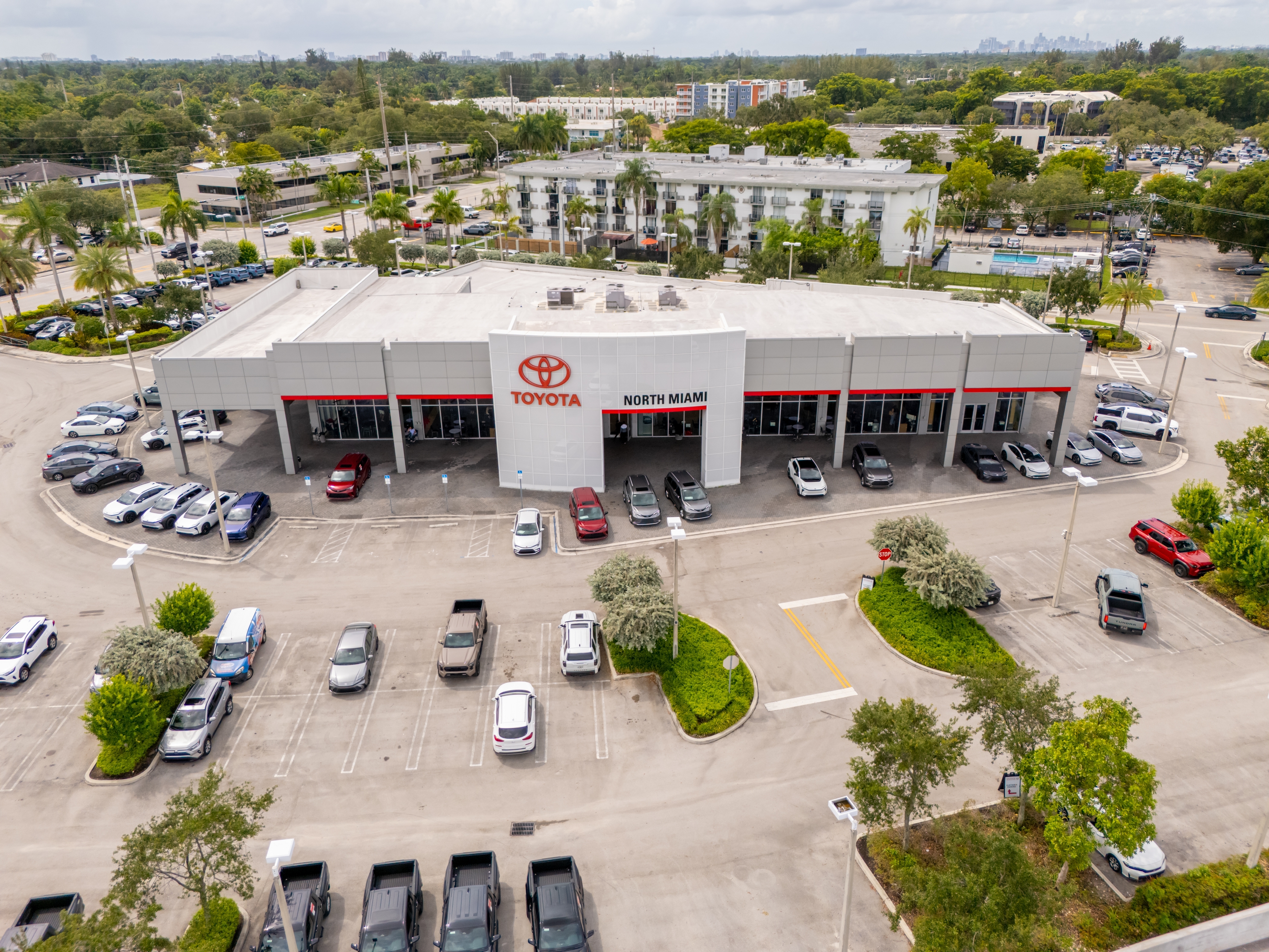 Aerial view of Toyota North Miami dealership and the surrounding market area.