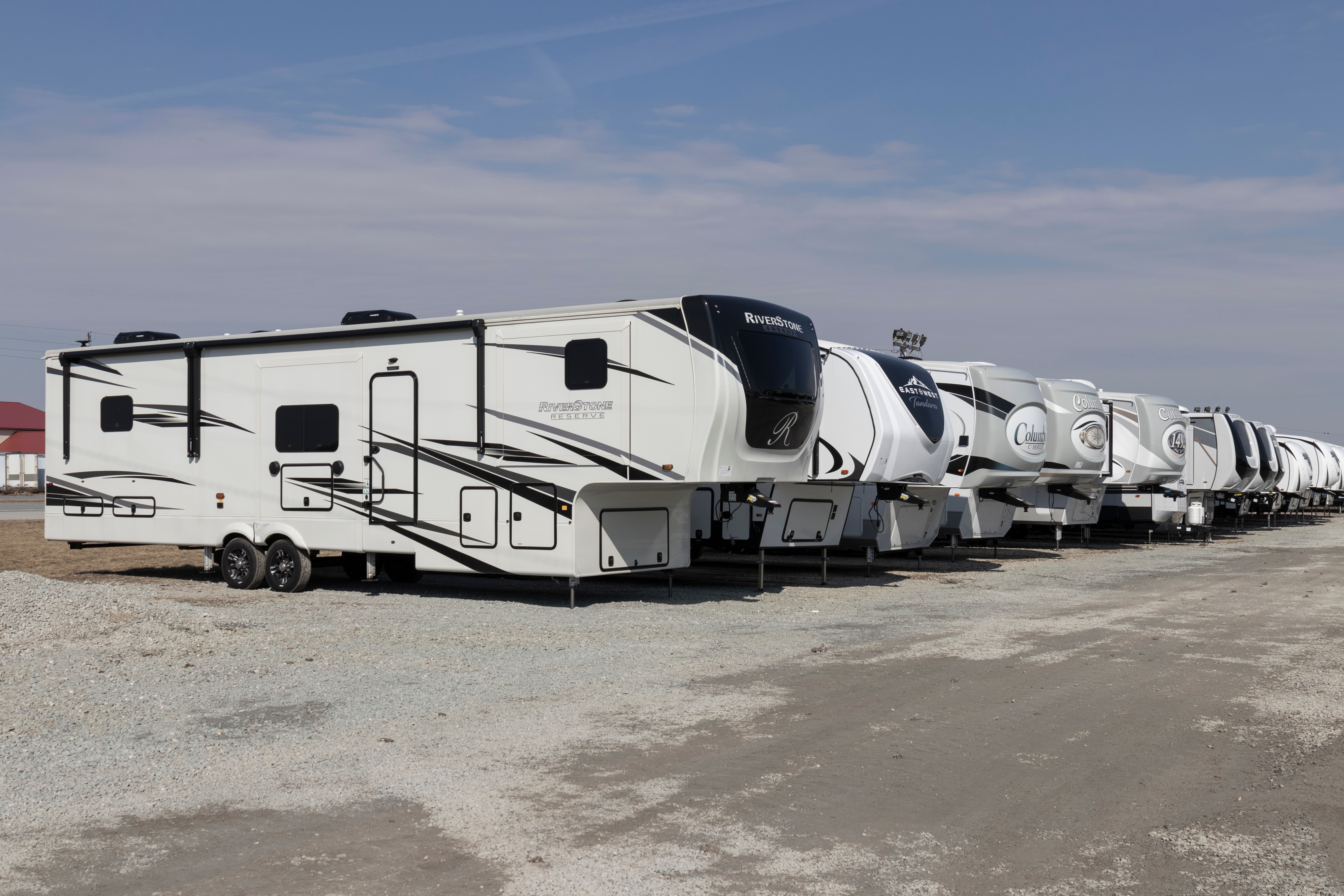 Family enjoying time beside a motorhome