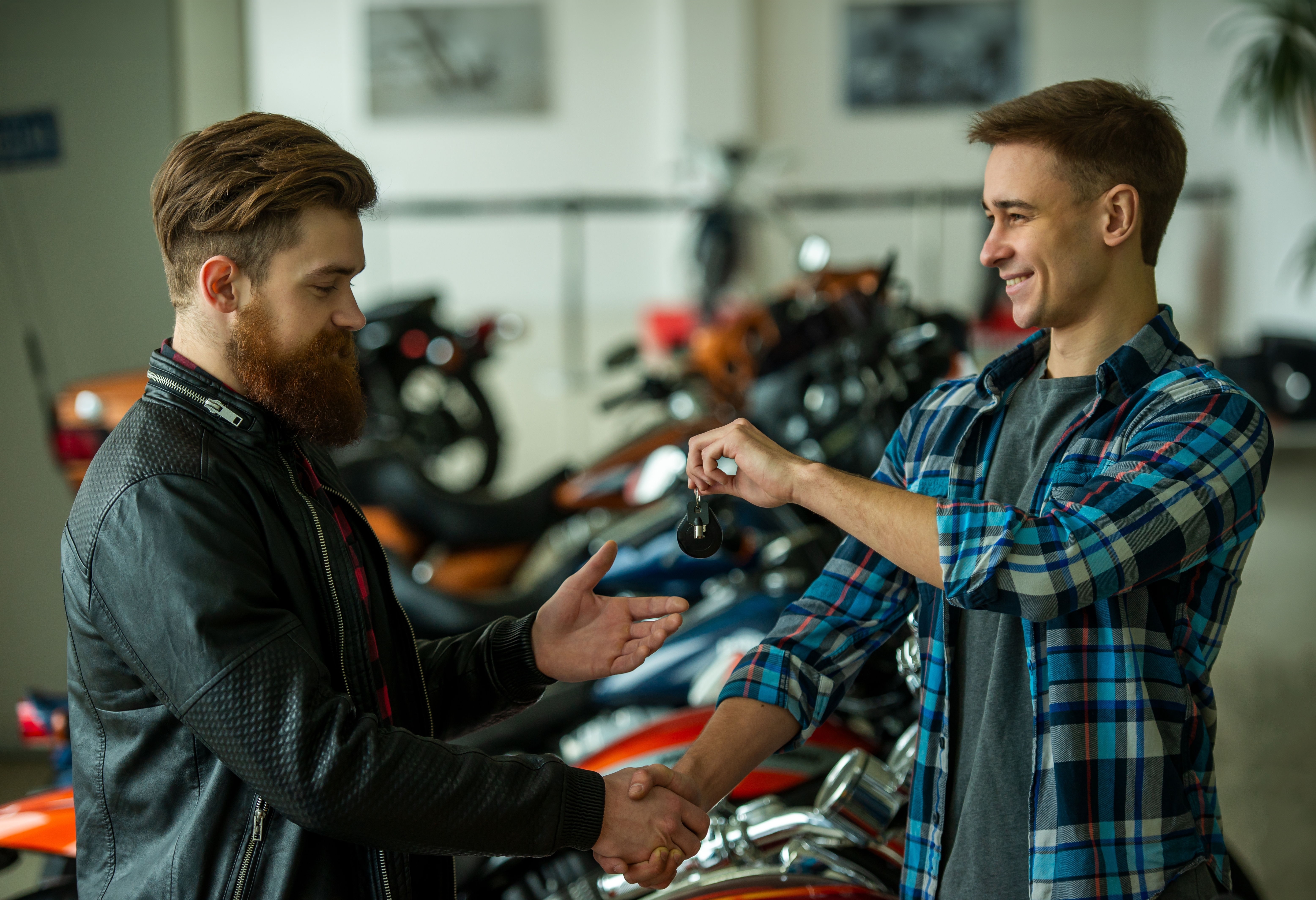 Customer and salesperson in a motorcycle showroom