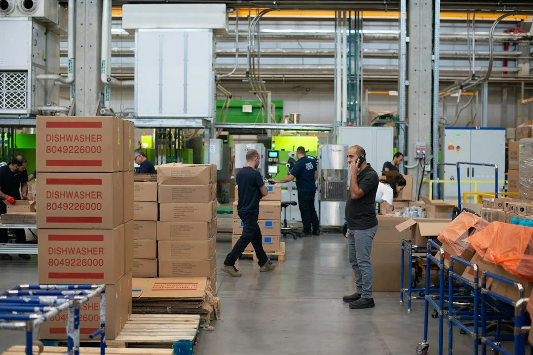 Warehouse team working among business stock and equipment