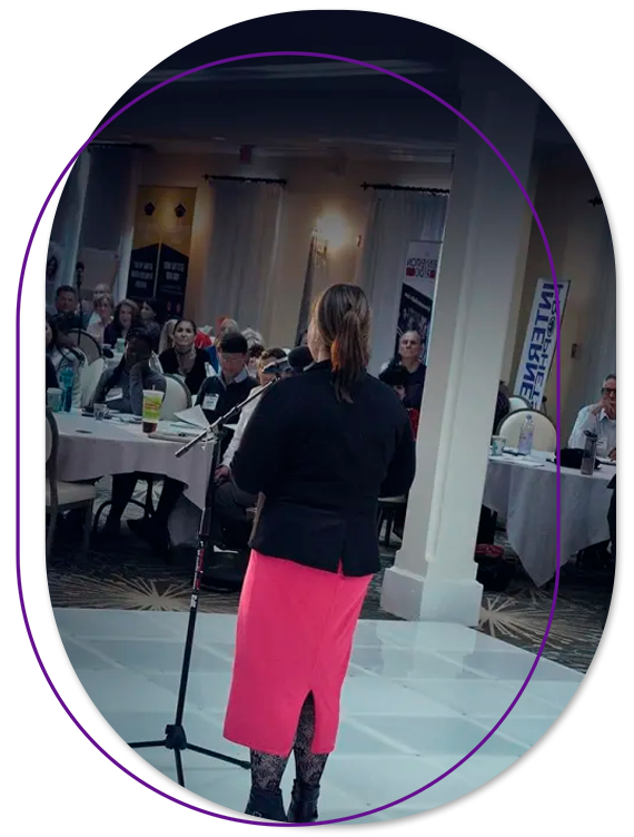 Woman speaking confidently on stage