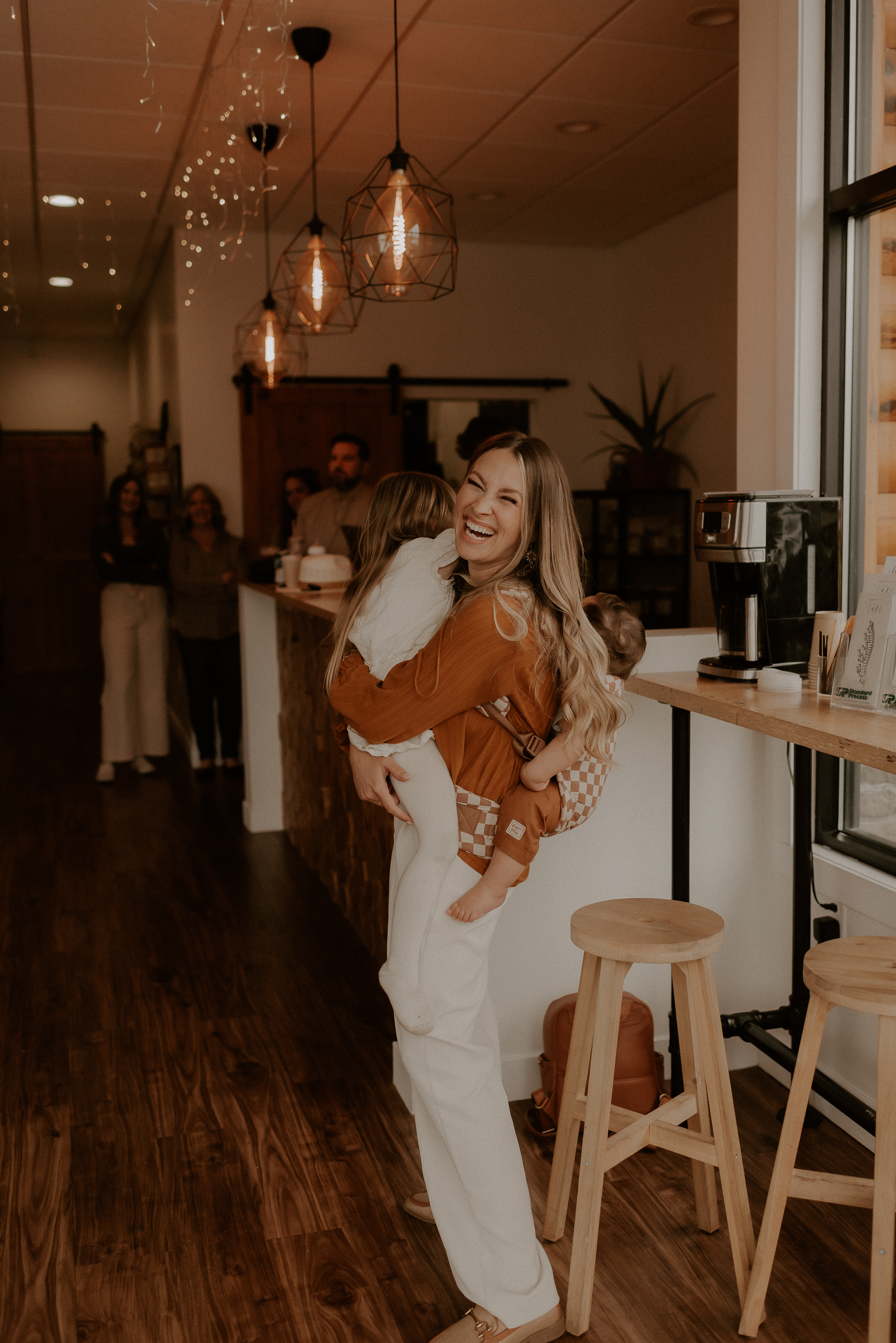 Warm authentic family interaction at Rise Chiropractic