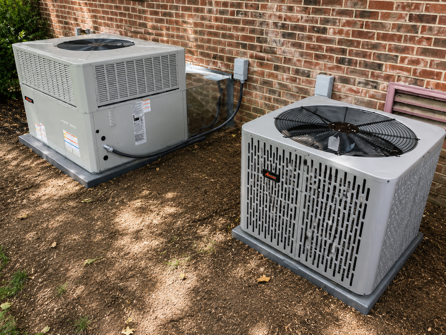 Commercial rooftop HVAC unit being serviced by a technician