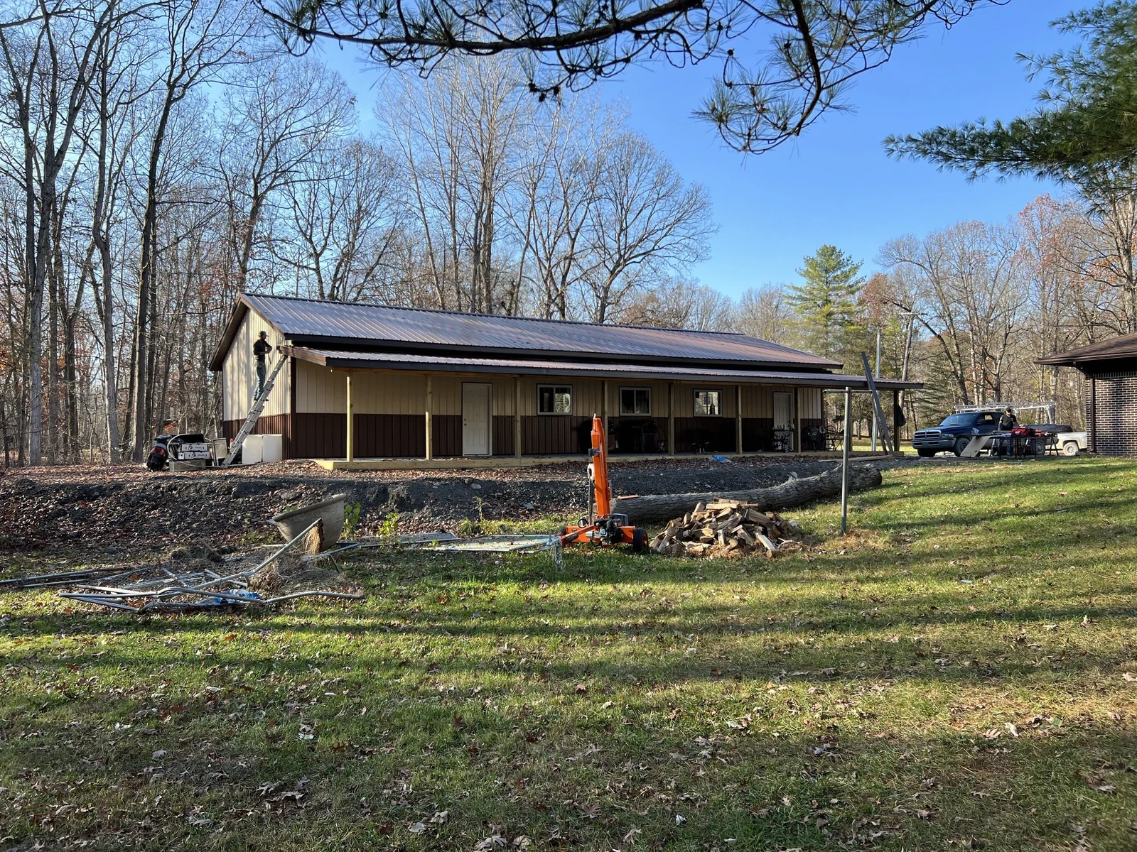 Large pole barn and garage project with a covered side area