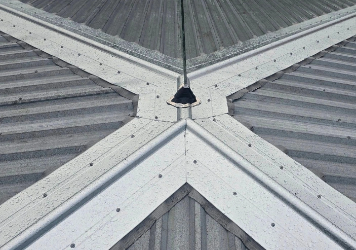 Roof re-screw and maintenance work preventing leaks and extending roof life