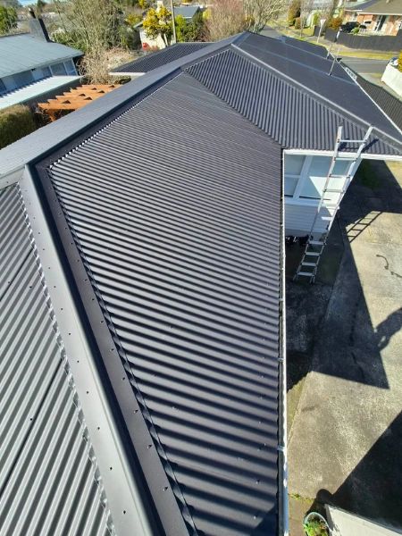 Professional roof repair and flashing replacement on a Waikato residential property