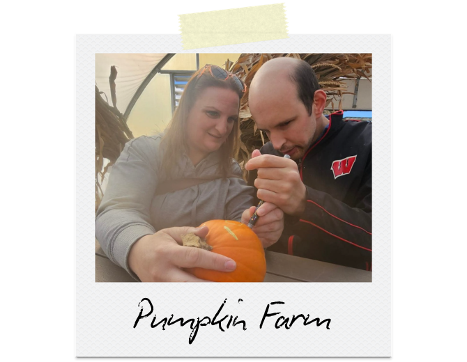 Pumpkin Farm: With the help of staff, a man is drawing on a pumpkin.