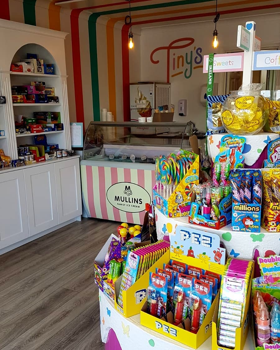 The sweet counter and colourful interior displays at Tiny's