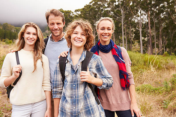 Family laughing and connecting together outdoors