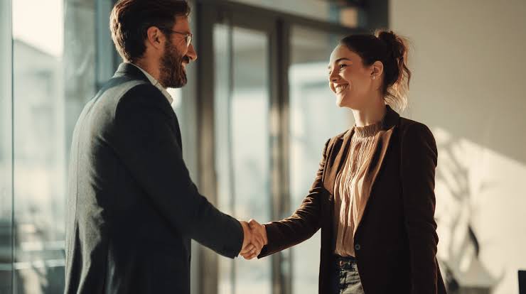 Two people shaking hands