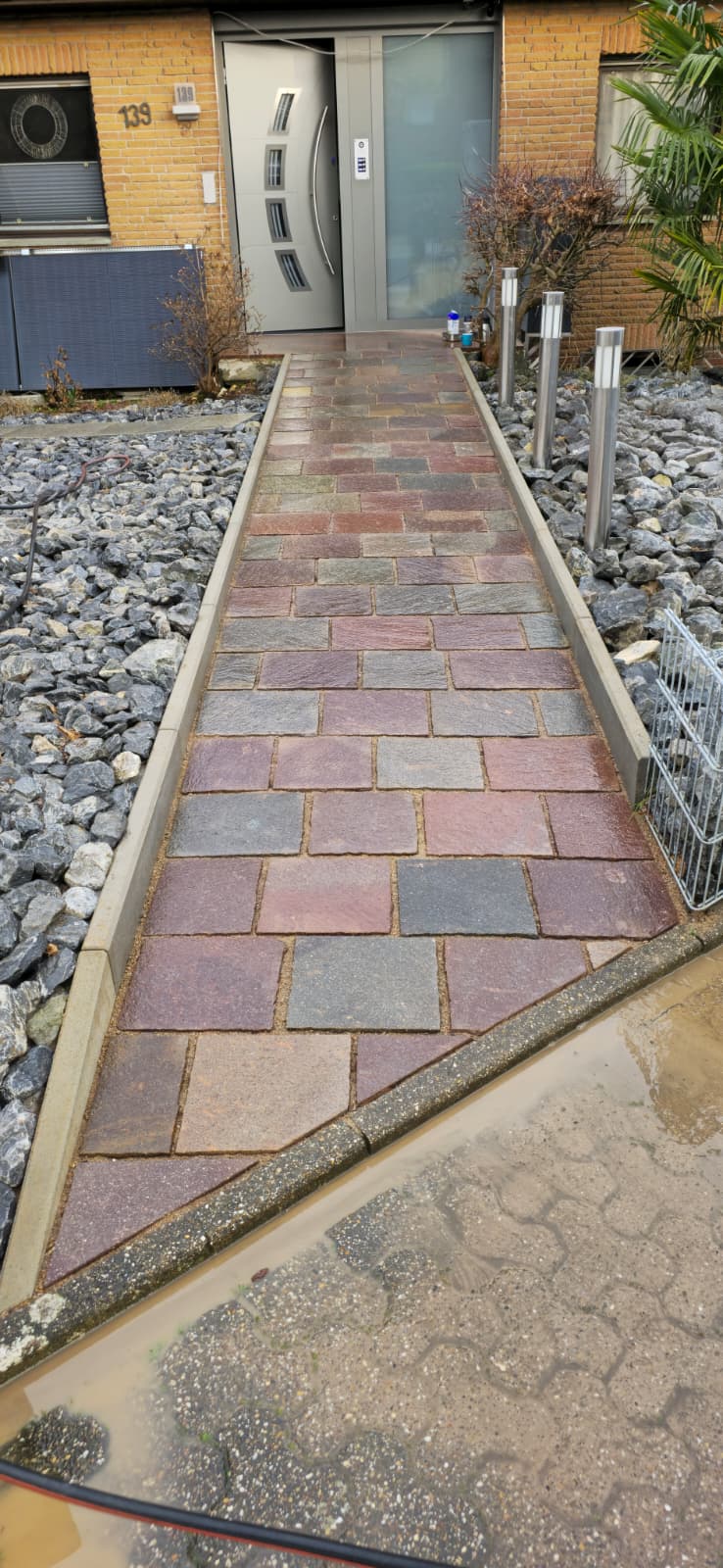 Gartenanlage mit Hochstämmen, Natursteinbeet und Holzsichtschutz – Gartenbau in Castrop-Rauxel