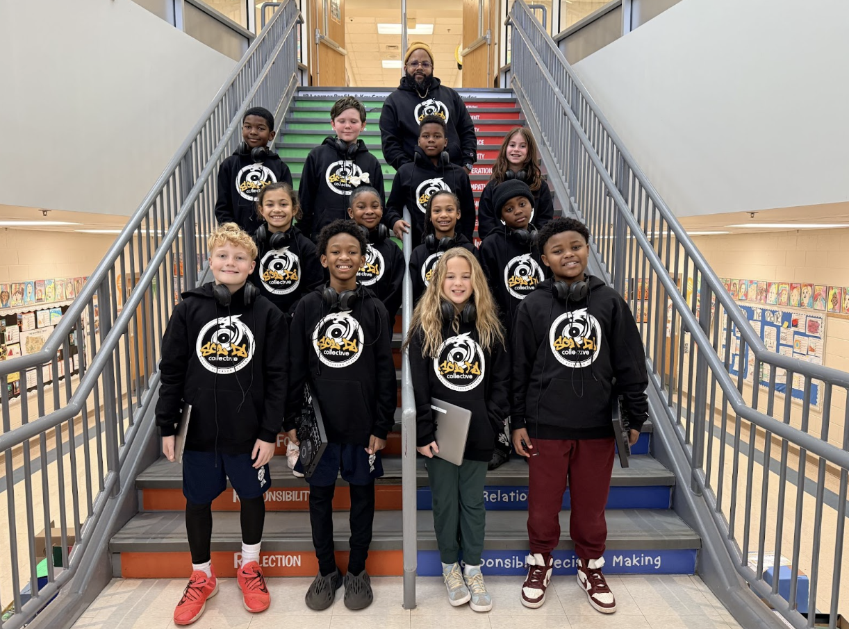 Student DJs in matching hoodies
