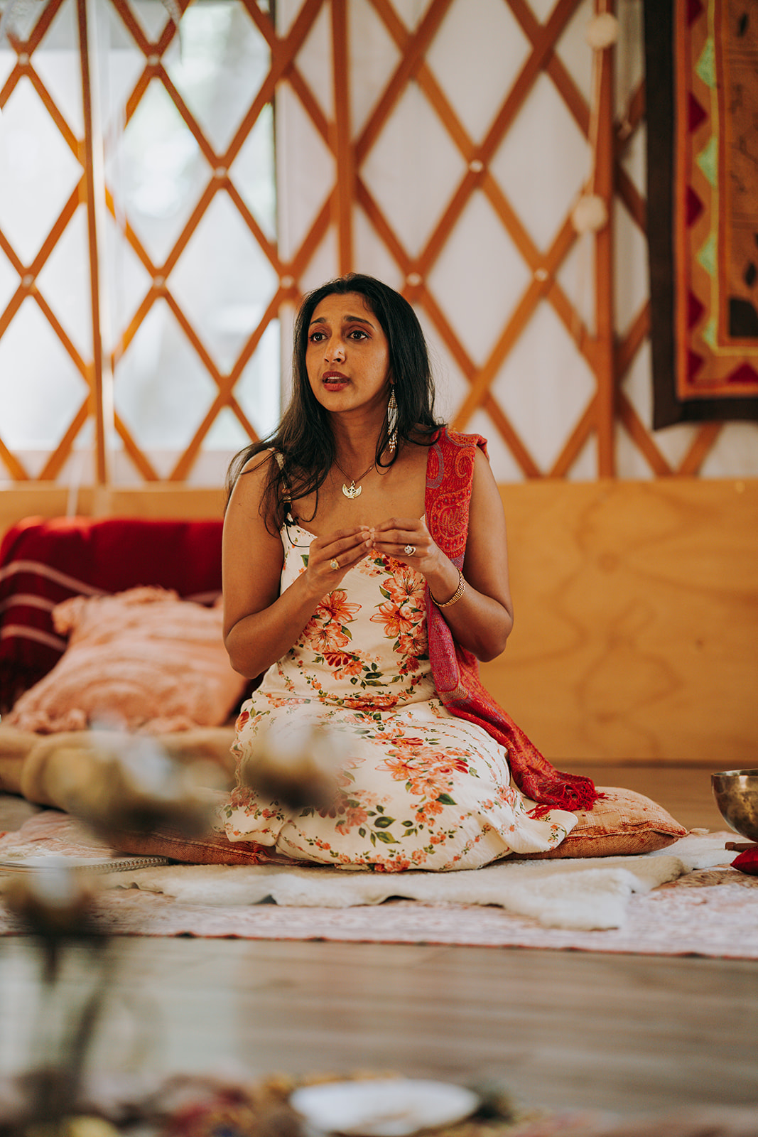 Aria Tau facilitating an intimate gathering of women