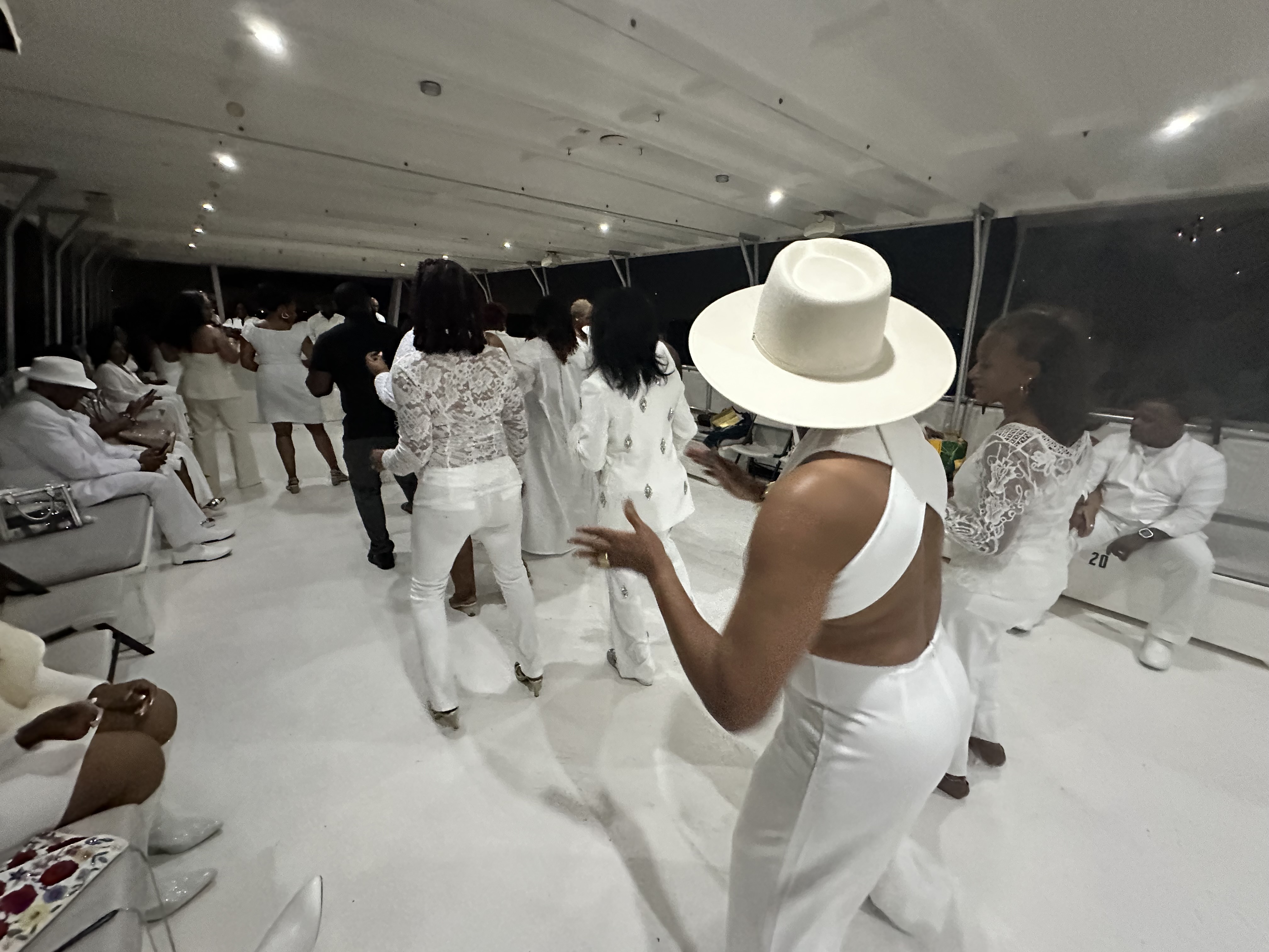 Guests enjoying the yacht celebration