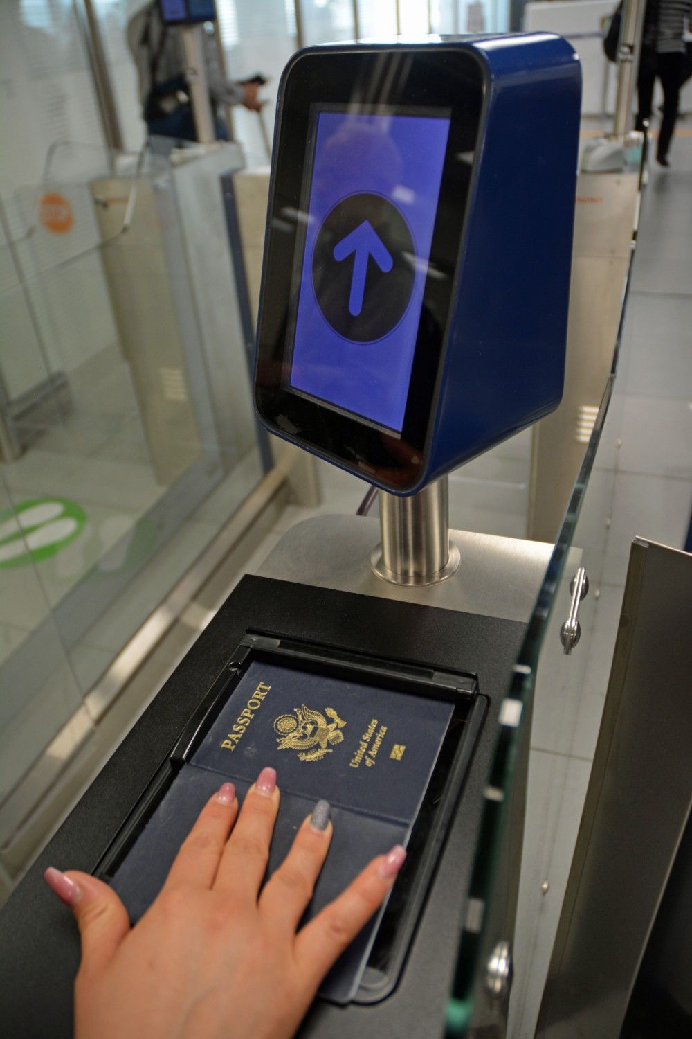 Open passport on airport check-in counter Open passport on airport check-in counter