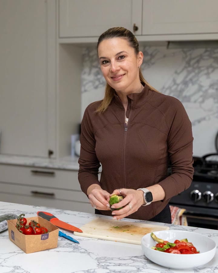 Kat Jakubcova, personal trainer and menopause specialist, in her kitchen