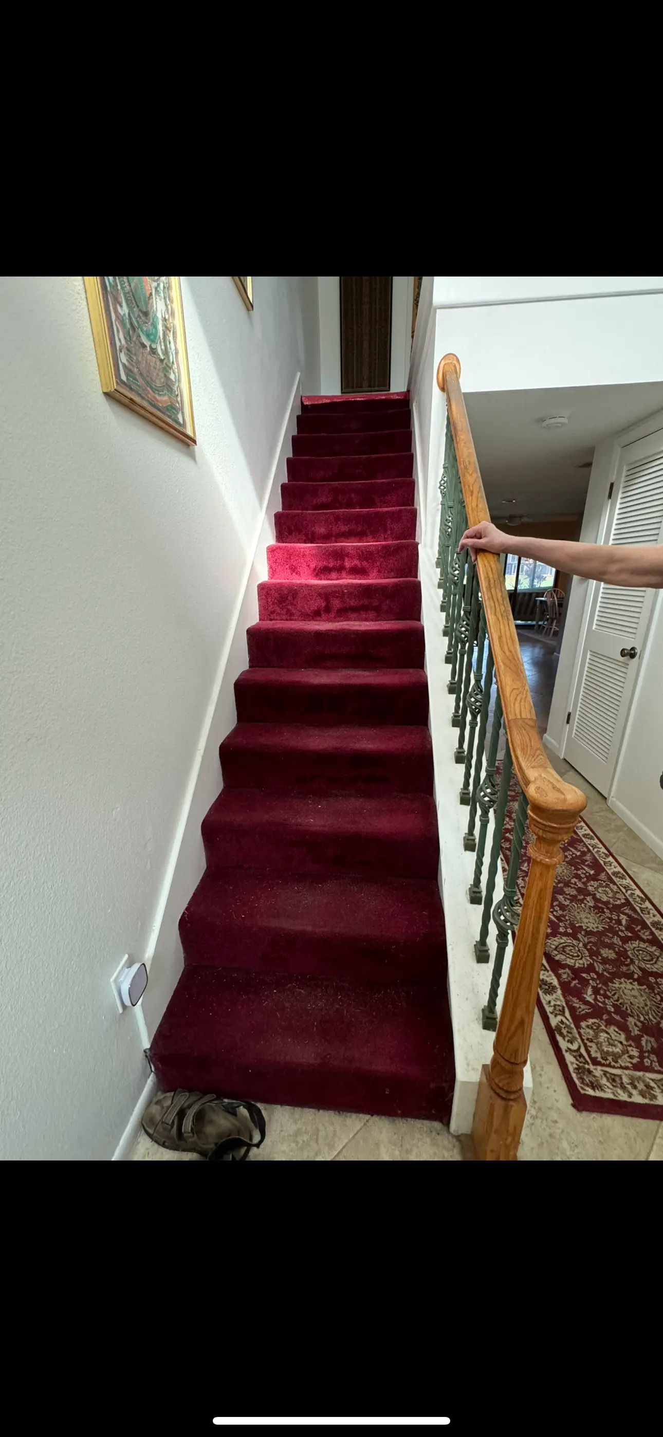 Completed staircase renovation with new flooring Melbourne FL - GC Trusted Builders